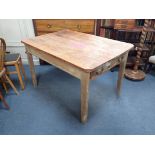 A 19TH CENTURY PINE KITCHEN TABLE