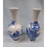 A PAIR OF CHINESE BLUE AND WHITE BOTTLE VASES