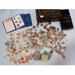 A QUANTITY OF COINS AND STAMPS