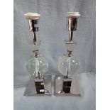 A PAIR OF CONTEMPORARY CHROME AND GLASS TABLE LAMPS