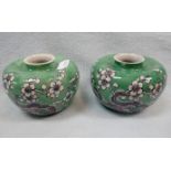 A PAIR OF CHINESE GREEN GLAZED SQUAT VASES