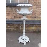 A VICTORIAN CAST IRON JARDINIERE