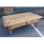 A 19TH CENTURY PINE KITCHEN TABLE