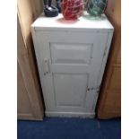 A SMALL WHITE PAINTED CUPBOARD