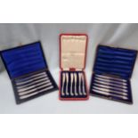 THREE BOXED SETS OF FILLED SILVER HANDLED KNIVES