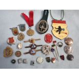 A COLECTION OF GERMAN AND OTHER MILITARY BADGES