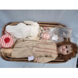 AN ARMAND MARSEILLES BISQUE HEADED DOLL