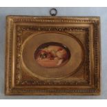 A MINIATURE OIL ON BOARD PAINTING OF A KING CHARLES SPANIEL