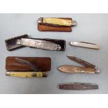 A COLLECTION OF SILVER AND SILVER PLATED PEN KNIVES