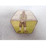 AN ENAMELLED SILVER PILL BOX DECORATED WITH A GOLFER