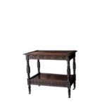 A CARVED OAK DRINKS TROLLEY