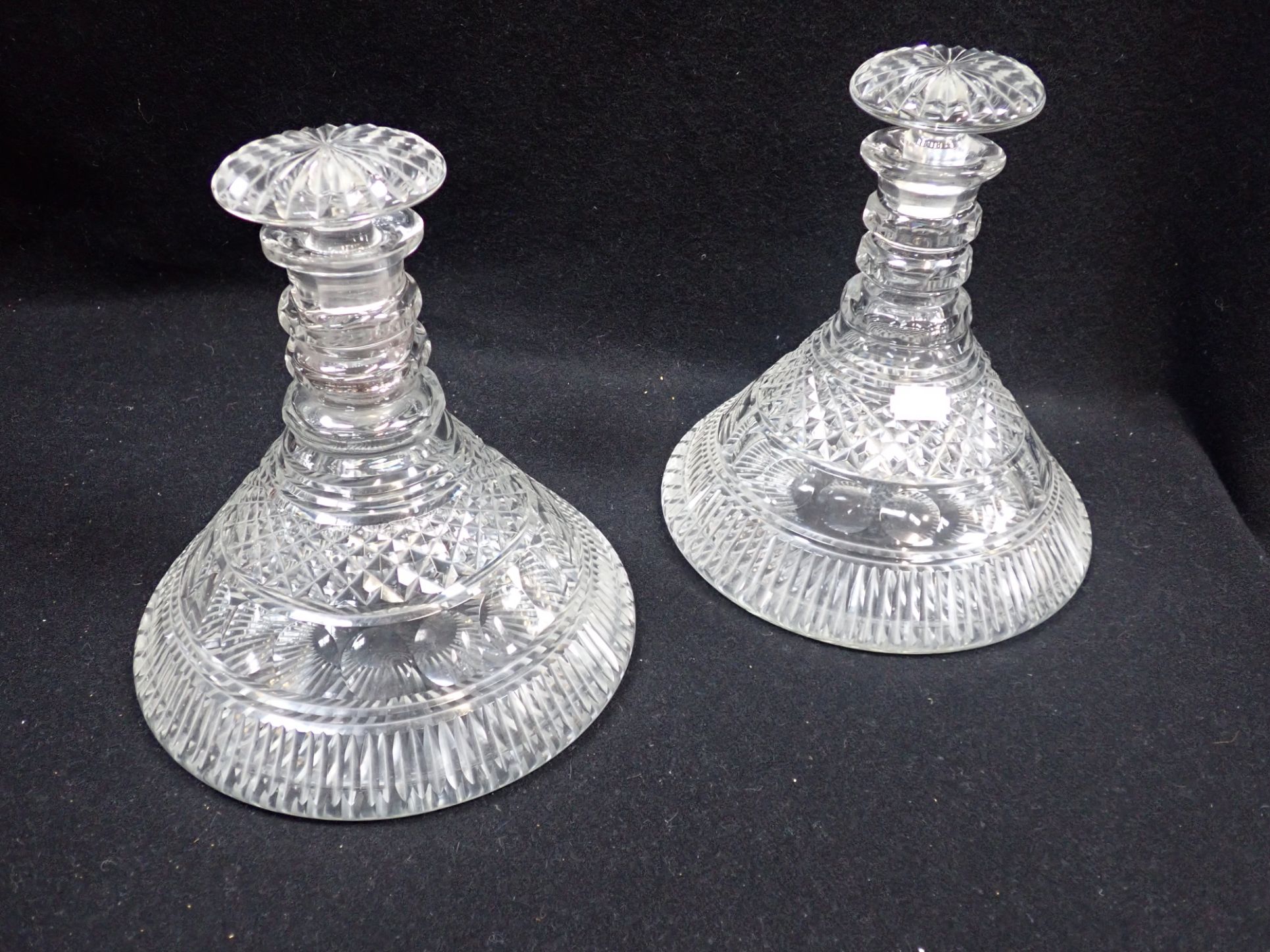 A PAIR OF CUT GLASS SHIP'S DECANTERS