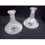 A PAIR OF CUT GLASS SHIP'S DECANTERS