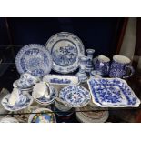 A COLLECTION OF DRESDEN BLUE AND WHITE CUPS AND SAUCERS