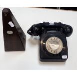 A VINTAGE BLACK DIAL TELEPHONE