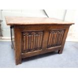 A SMALL REPRODUCTION OAK COFFER