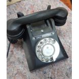 A VINTAGE BLACK BAKELITE TELEPHONE