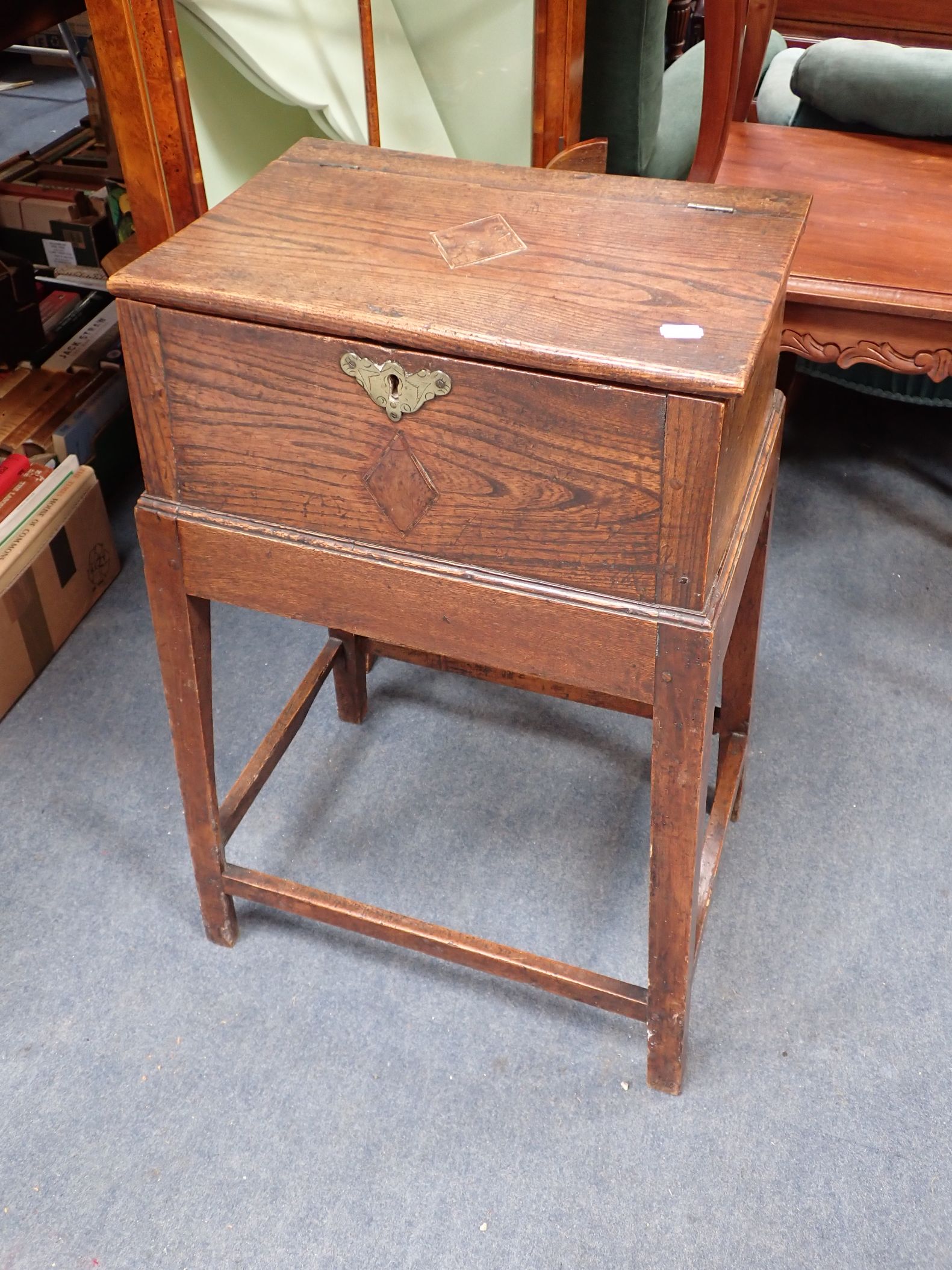 A GEORGE III ELM BOX ON STAND