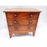 A 19TH CENTURY MINIATURE OR 'APPRENTICE' CHEST OF DRAWERS