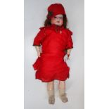 A LARGE EARLY 19TH CENTURY SCHOENAU & HOFFMEISTER BISQUE HEADED DOLL
