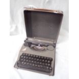 A VINTAGE 'HERMES BABY' TYPEWRITER