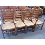 A SET OF EIGHT 18TH CENTURY STYLE ASH LADDERBACK CHAIRS