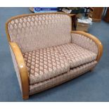 AN ART DECO STYE TWO SEATER SOFA