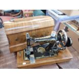 A VINTAGE 'SERATA' HAND SEWING MACHINE