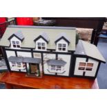 A LARGE VINTAGE DOLL'S HOUSE, 'MAYFLY COTTAGE'