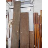 A LARGE THICK PLANK OF OAK