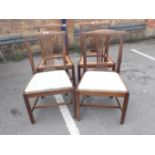 A SET OF FOUR MAHOGANY DINING CHAIRS