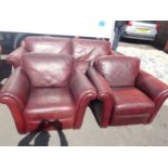 A NATUZZI BURGUNDY LEATHER SOFA AND 2 ARMCHAIRS