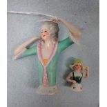 A 1930S CERAMIC 'HALF DOLL'