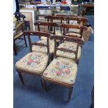 A SET OF SIX SIMULATED ROSEWOOD DINING CHAIRS