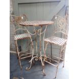 A VINTAGE STYLE WROUGHT IRON 'BISTRO' GARDEN SET