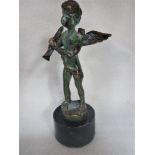 A PATINATED BRONZE FIGURE OF PAN