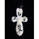 A 19TH CENTURY DIEPPE CARVED IVORY CROSS PENDANT