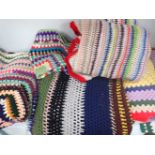 A COLLECTION OF CROCHETED BLANKETS