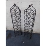 A PAIR OF WROUGHT IRON WINE RACKS