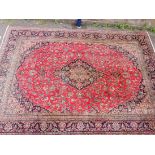 A LARGE PERSIAN DESIGN RUG