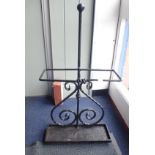 A WROUGHT IRON STICK STAND