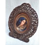 A 19TH CENTURY OVAL CERAMIC PORTRAIT OF A WOMAN