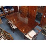 A WILLIAM TILLMAN MAHOGANY TWIN PILLAR DINING TABLE