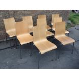 NINE MODERN ASH VENEERED PLY AND TUBULAR STEEL DINING CHAIRS