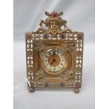 A VICTORIAN EASEL FRAMED CLOCK