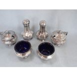 A SILVER CRUET SET