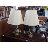 A PAIR OF BRASS TABLE LAMPS