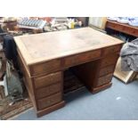 AN EDWARDIAN WALNUT DESK