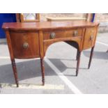 A GEORGE III MAHOGANY BOWFRONTED SIDEBOARD