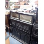 A 19TH CENTURY "QUAINT" AMATEUR DESIGN EBONISED SECRETAIRE BOOKCASE